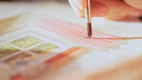 Artist Painting Watercolor Window with Fine Brush