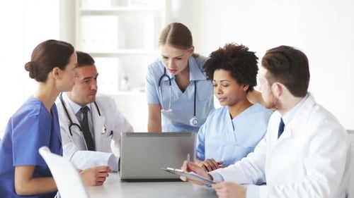 Hospital, Profession, People, Technology and Medicine Concept - Group of Doctors With