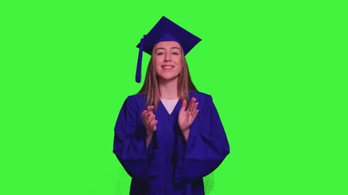 Graduated student clapping hands on green screen