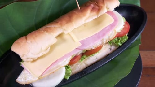Close up of a Sandwich with Ham and Cheese