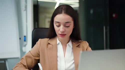 Business Woman Smiling Working in Modern Office