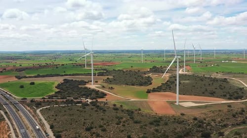 Aerial View of Wind Turbines in Rural Landscape