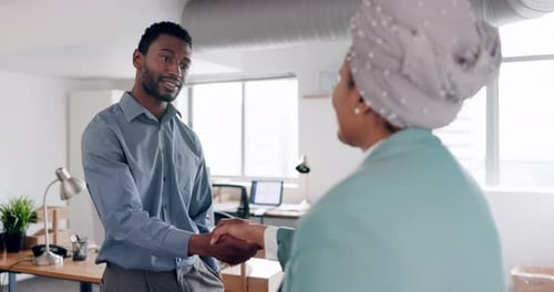Business Handshake in Modern Office Environment