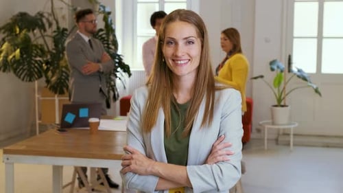 Portrait of smiling businesswoman in office.