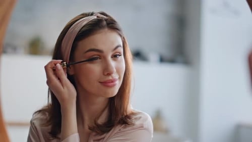 Smiling Lady Applying Mascara at Morning Beauty Routine Closeup Serene Woman