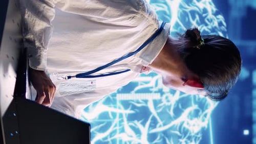 Young Adult Working with Holographic Brain Technology