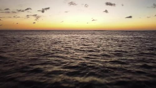 Aerial view of sunset horizon over the sea.