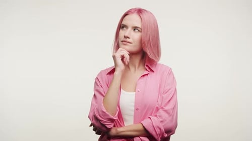 Smiling Woman Thinking with Pink Hair