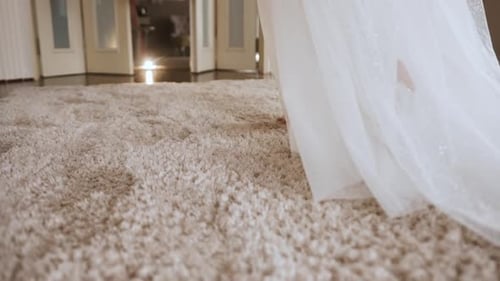close up white sheer curtain with sun light with shadow shade on wooden floor home interior design