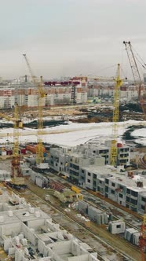 Construction Site Yellow Cranes of Building in Progress