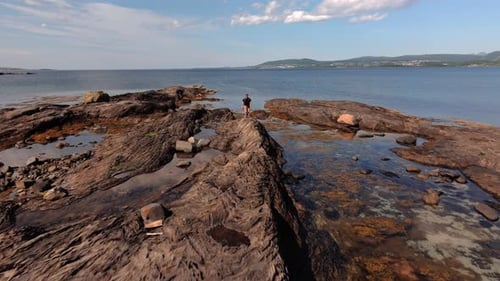 Aerial Views of Volcanic Rocky Norway Sunlit Skies Stone Textures and the Journey of a Travele