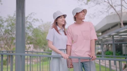 Close-up of a couple spending their vacation smiling in the bright sunshine. A charming couple spend