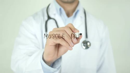 Doctor Writes Muscle Pain on Transparent Surface