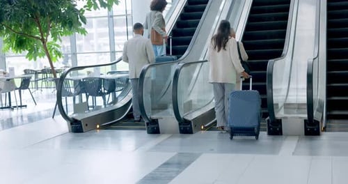 Airport, back and corporate people on an escalator with luggage for international travel