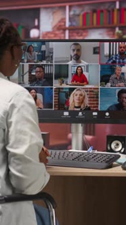 Vertical Video Remote Employee in Home Office Saluting Colleagues During Online Videocall