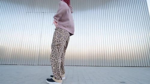 Young Urban Dancer Performing Energetic Street Dance Routine