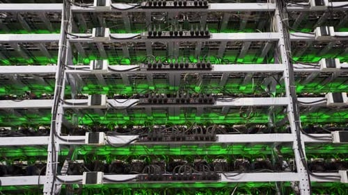 Cryptocurrency Mining Equipment on Large Farm ASIC Miners on Stand Racks Mine Bitcoin in Server Room