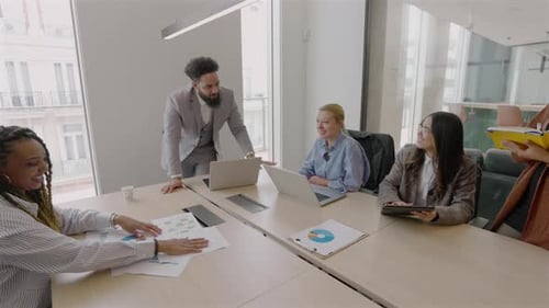 A Diverse Team of Professionals Collaborating Effectively in a Modern Office Environment