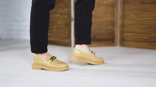 Tan Platform Loafers on Model's Feet