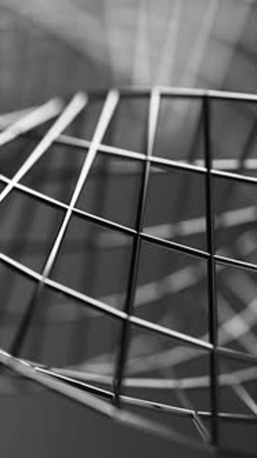 Endless 3D rotation of a Mobius loop made of chrome mesh.