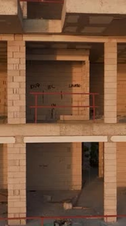 Vertical Video Seaside Construction Zone Aerial Insight Into Mediterranean Coastal Site