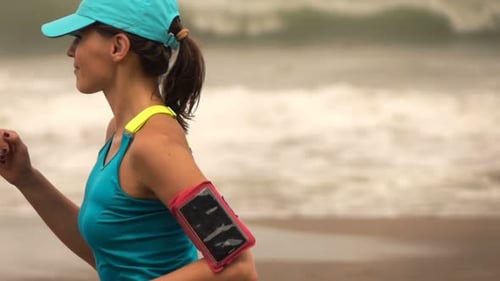 Woman Jogging On Beach, Super Slow Motion 240fps