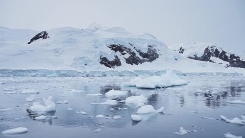 Antarctica Icebergs Landscape Aerial Drone Shot of Glacier and Mountains Scenery on the Southern Oce