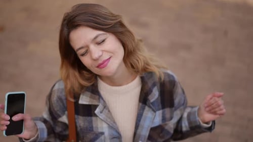 Relaxed Happy Woman Dancing in Slow Motion Standing on Pavement Alley in Autumn Park