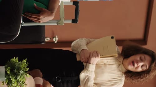 Vertical Video Hotel Manager Greeting Tourists