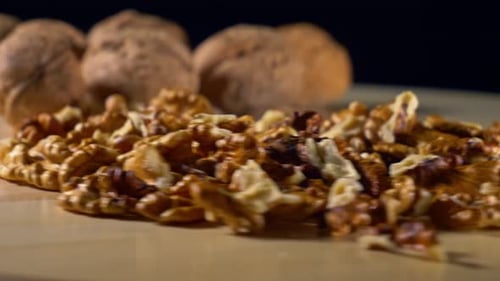 Walnuts On Wooden Plate 2K