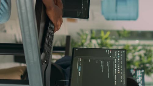 Vertical Video African American Coder Developing App Interface with Html Code and Script