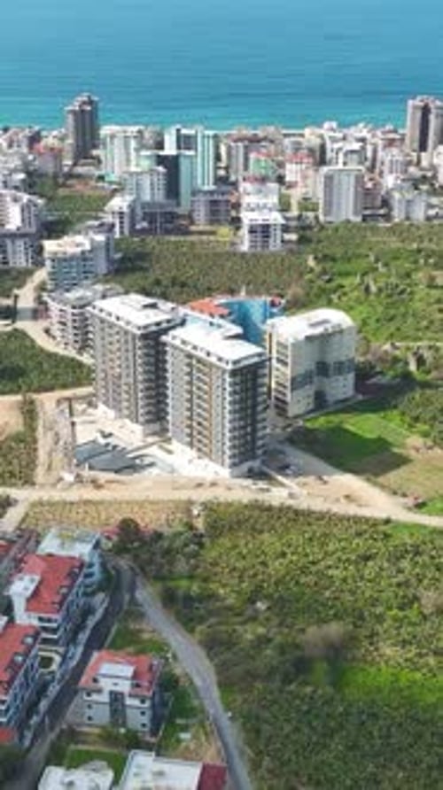 Vertical Video Sleek and Stylish Facade of a New MultiStory Residential Complex