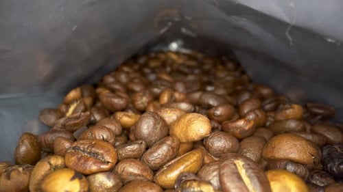 Coffee beans in the package close up 4K