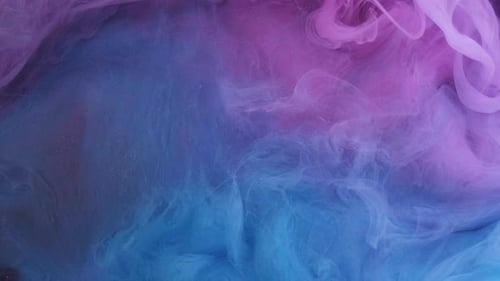 Abstract Swirling Pink and Blue Ink Background