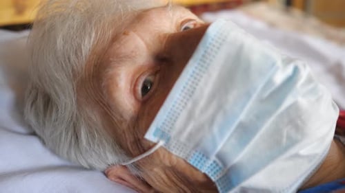 Portrait of Granny Wearing Medical Protective Mask From Virus