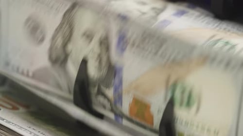 Dollar Banknotes in Automated Currency Counting Machine