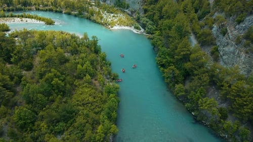 group rafting on river with aerial drone view