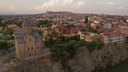 Tbilisi City and Kura River at Sunset