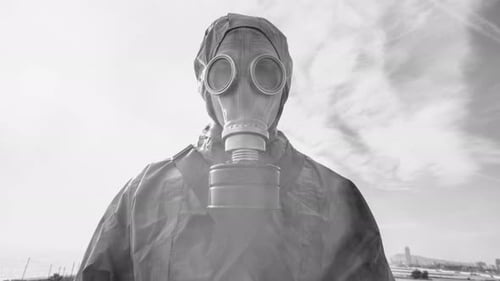 Figure in Gas Mask in Post-Apocalyptic Setting