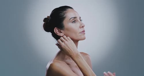 Skincare, antiaging and face of mature woman in studio with beauty, hydration