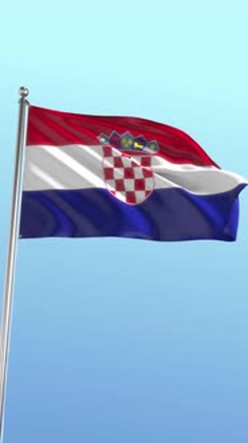 Realistic Waving Flag of Croatia Against Blue Sky