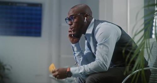 Airport Terminal Businessman Angry About Delayed Flight Talking and Shouting in Smartphone