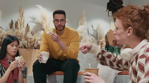 Young Adults Having Lunch Together at Work
