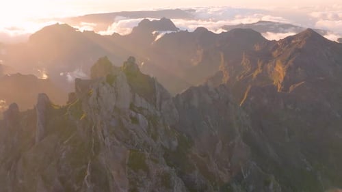 Stunning aerial views of mountain peaks during sunset in remote location