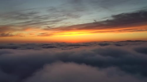 Sunset Above the Clouds Aerial View