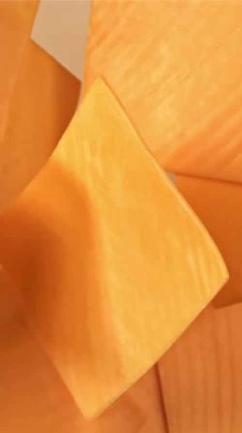 Slices of Cheddar Cheese Fly and Fall Filmed on a Highspeed Camera at 1000 Fps