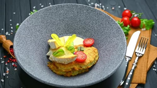 Gourmet Dish with Vegetables and Bread, Close Up