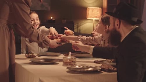 Family Celebrates Hanukkah With Donuts