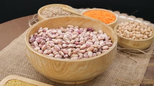 Wooden Bowls of Pinto Beans and Legumes