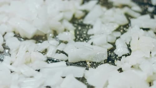 Onions Simmering in a Frying Pan